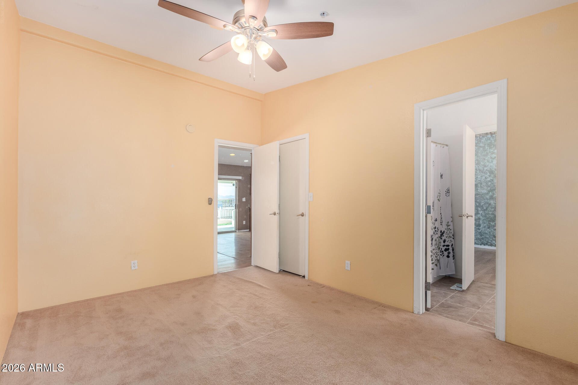 23851 West Tether Trail Wittmann, AZ 85361 - Photo 24 of 44 a view of an empty room with a window