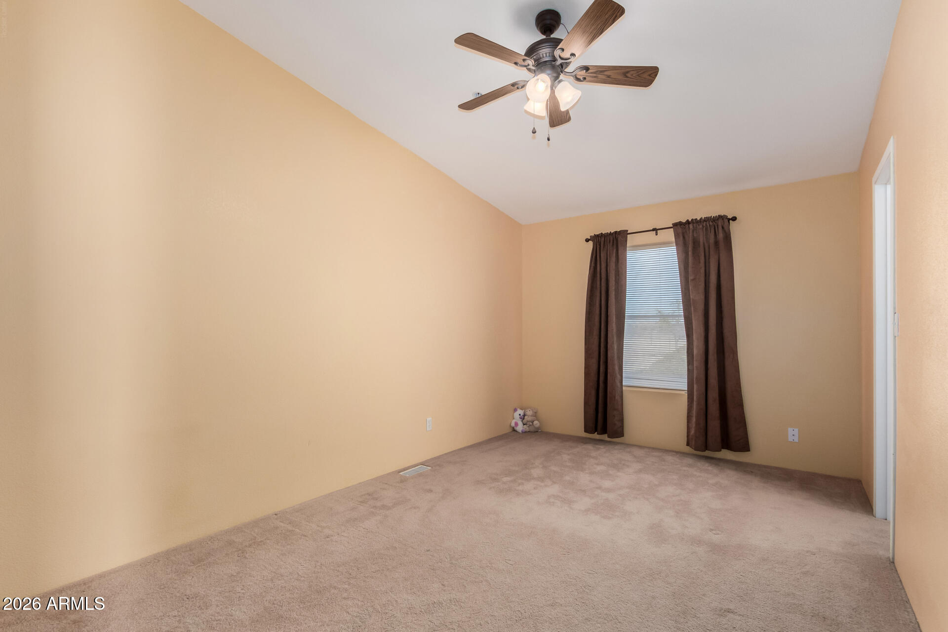 23851 West Tether Trail Wittmann, AZ 85361 - Photo 29 of 44 an empty room with a empty space and a ceiling fan