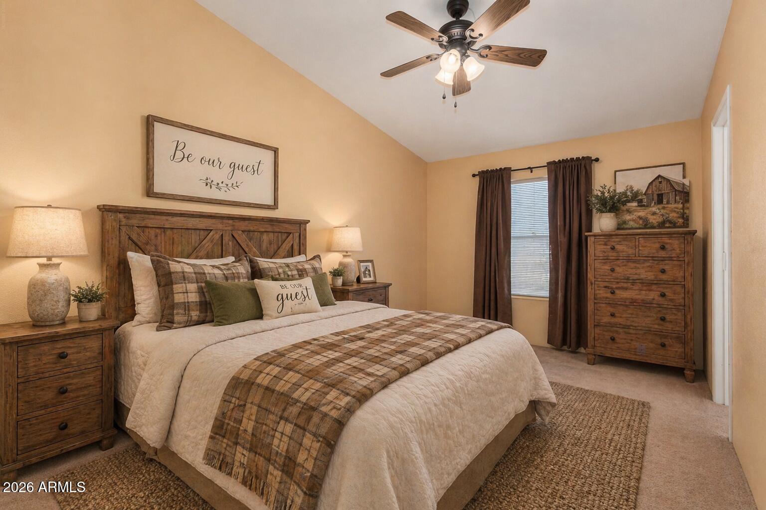 23851 West Tether Trail Wittmann, AZ 85361 - Photo 30 of 44 a bedroom with a bed and a chandelier