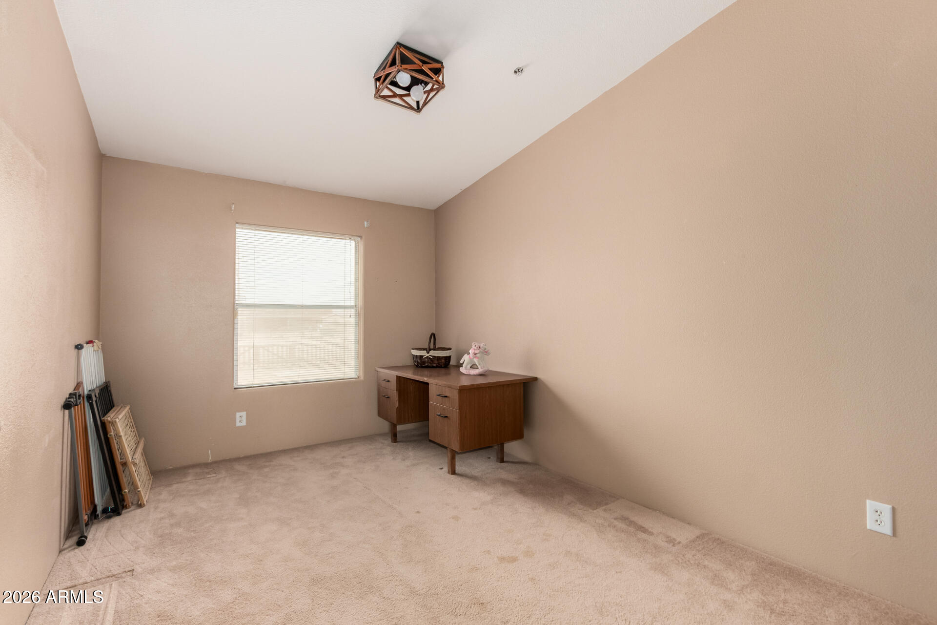 23851 West Tether Trail Wittmann, AZ 85361 - Photo 32 of 44 a room with a window