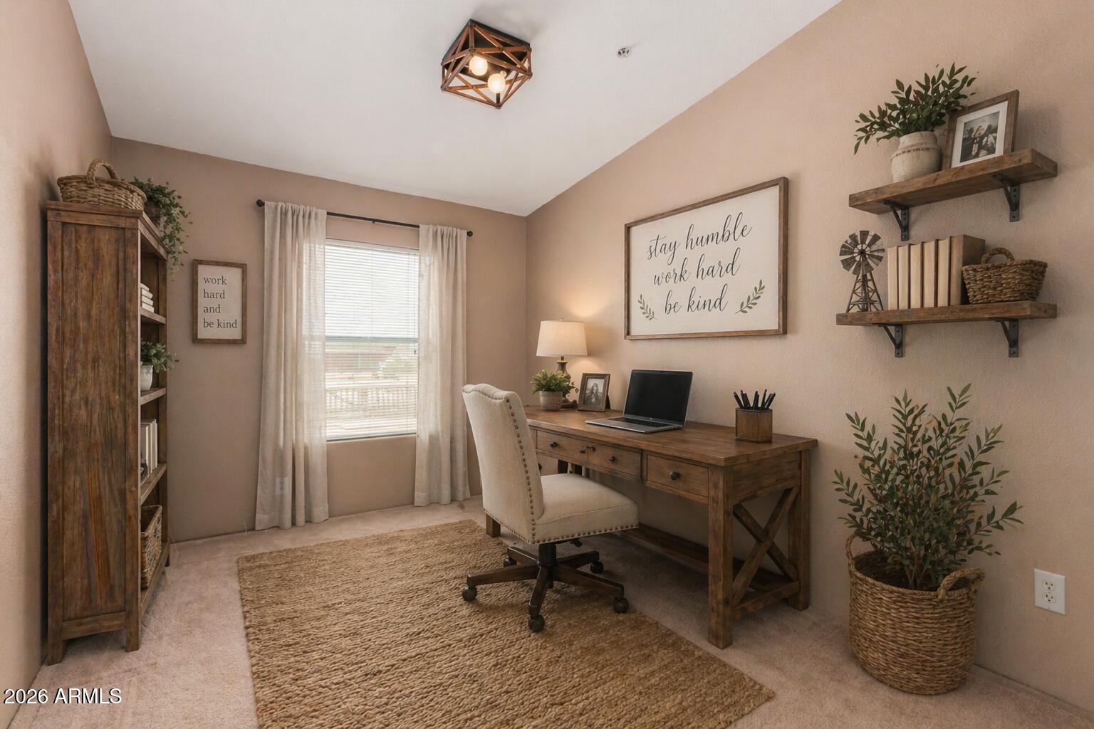 23851 West Tether Trail Wittmann, AZ 85361 - Photo 33 of 44 a view of a workspace with furniture and a window