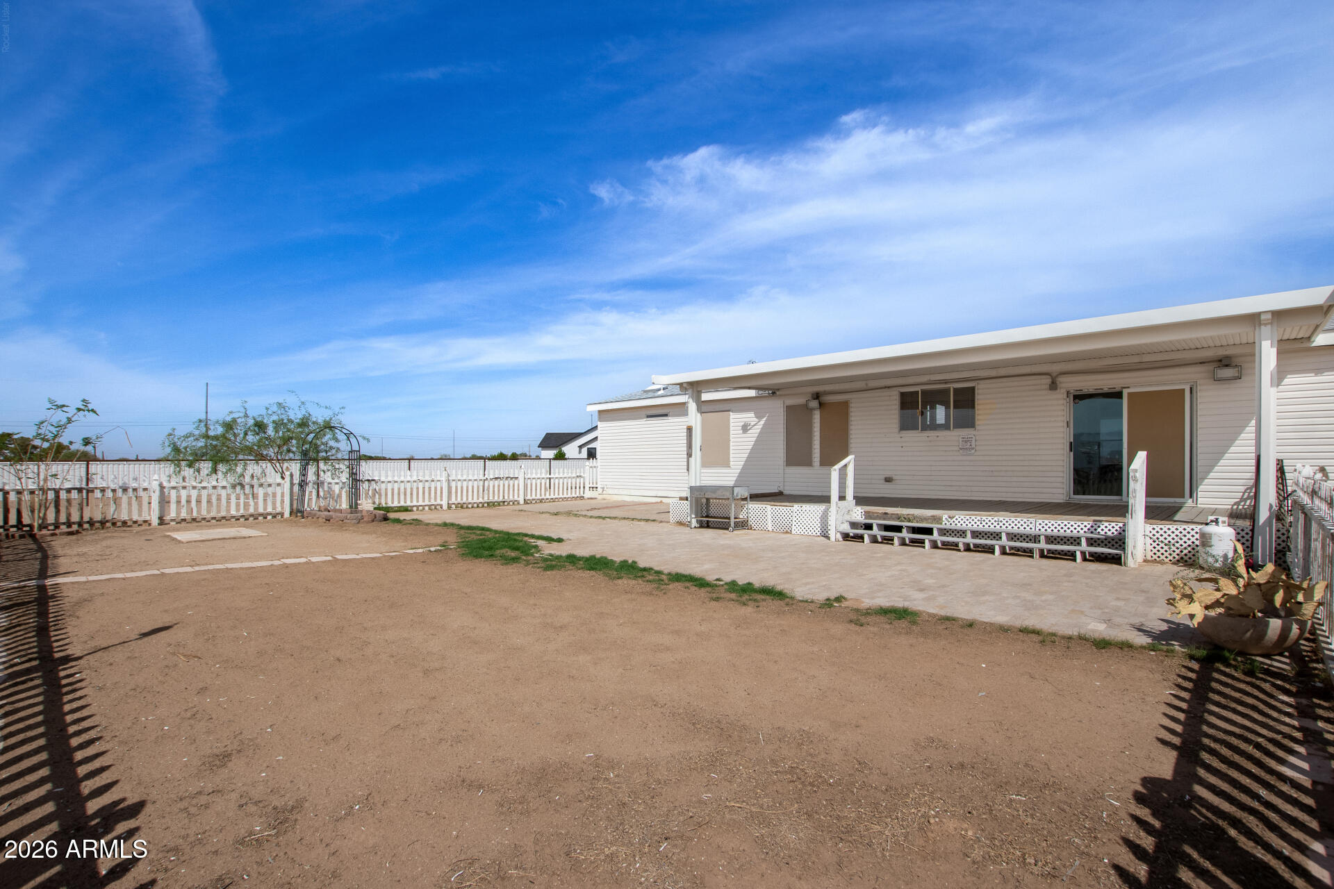 23851 West Tether Trail Wittmann, AZ 85361 - Photo 35 of 44 a view of a house with backyard and porch