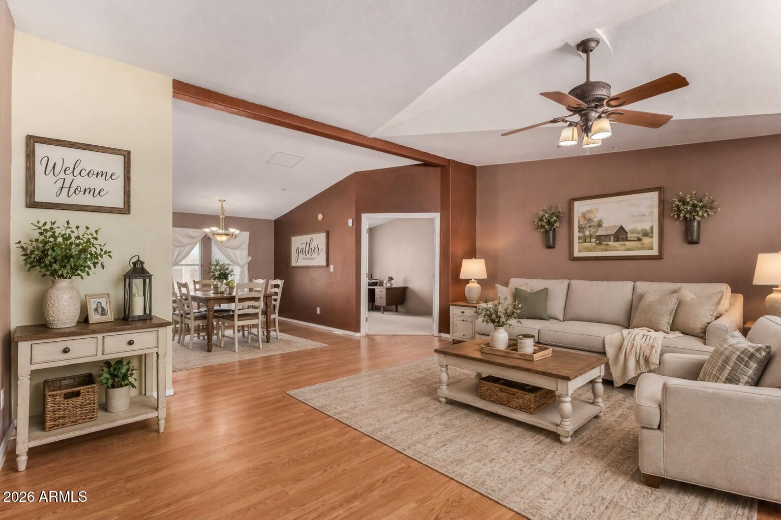23851 West Tether Trail Wittmann, AZ 85361 - Photo 4 of 44 a living room with furniture and wooden floor