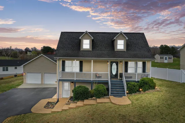 front view of a house with a yard