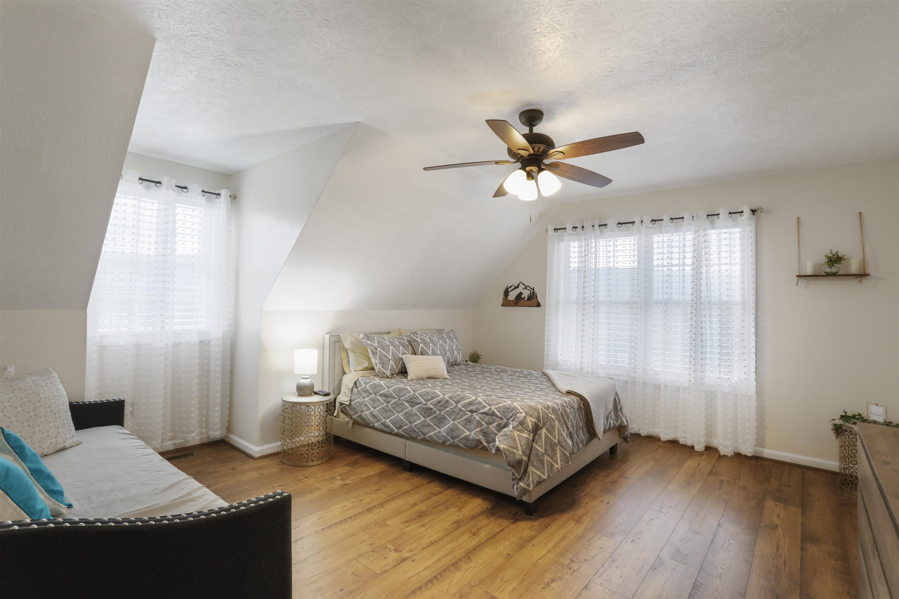 317 Locustdale Loop Shenandoah, VA 22849 - Photo 20 of 39 a bedroom with a bed and a couch