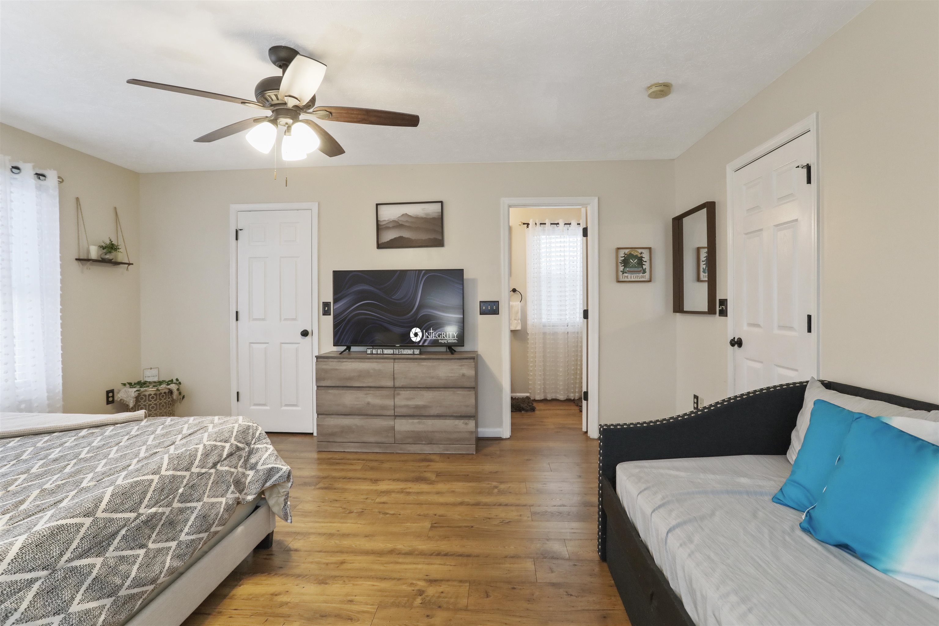 317 Locustdale Loop Shenandoah, VA 22849 - Photo 21 of 39 a bedroom with a large bed and a couch