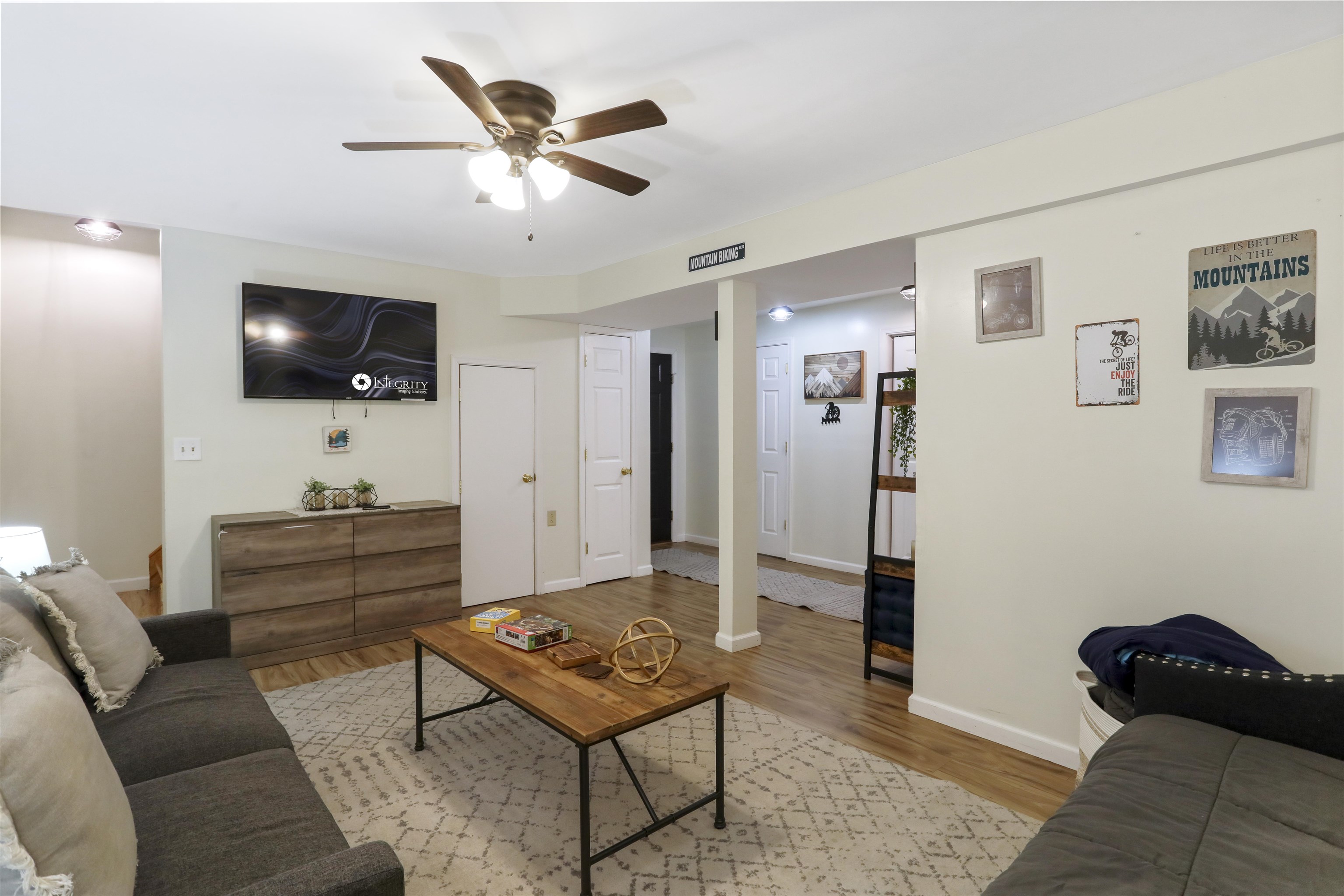 317 Locustdale Loop Shenandoah, VA 22849 - Photo 25 of 39 a living room with furniture and a flat screen tv