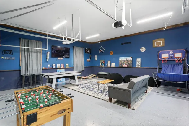 a backyard of a house with wooden fence and a bench