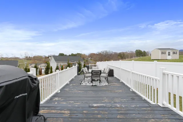 a view of balcony with furniture