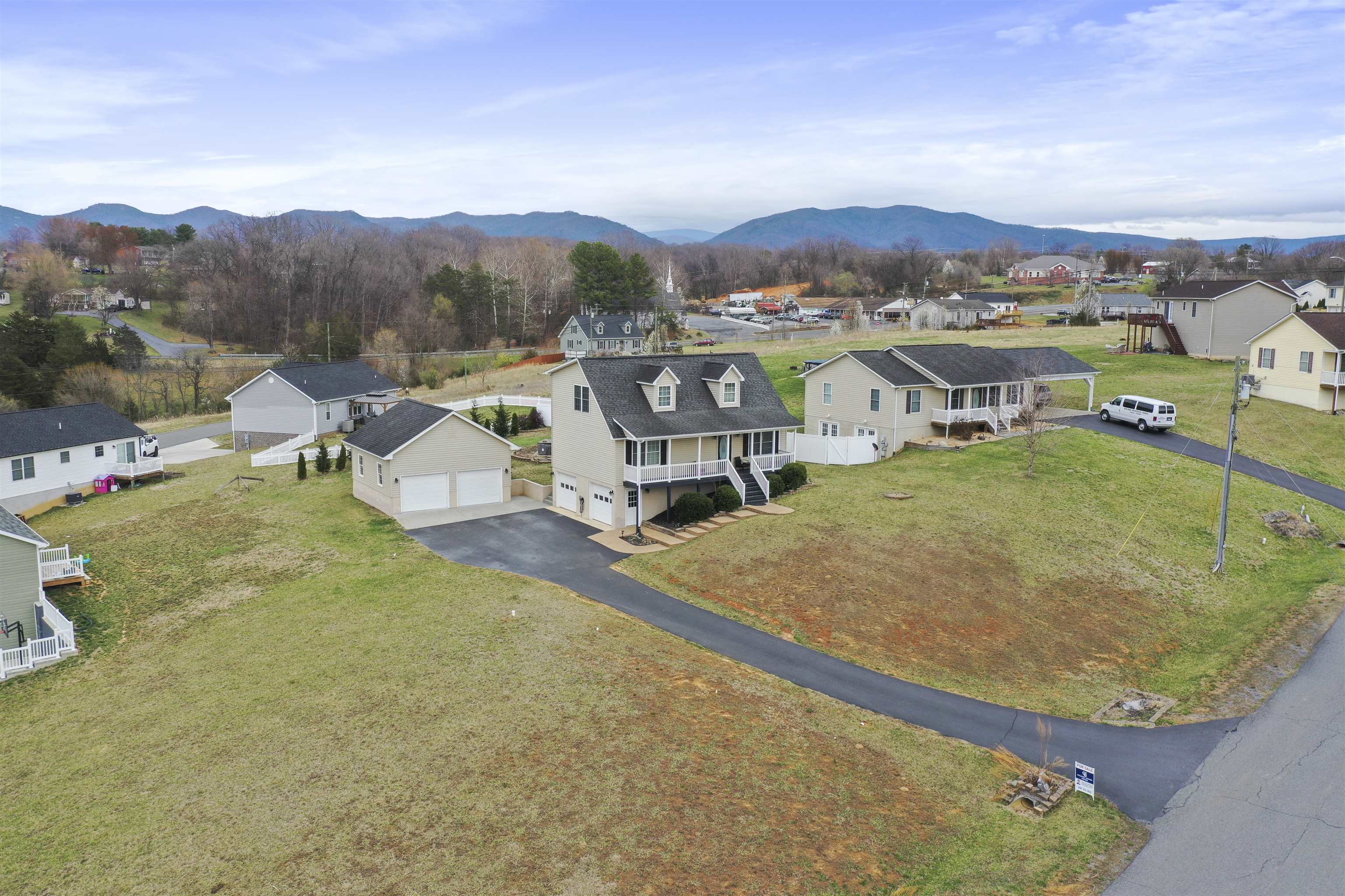 317 Locustdale Loop Shenandoah, VA 22849 - Photo 34 of 39 an aerial view of residential houses with outdoor space and trees