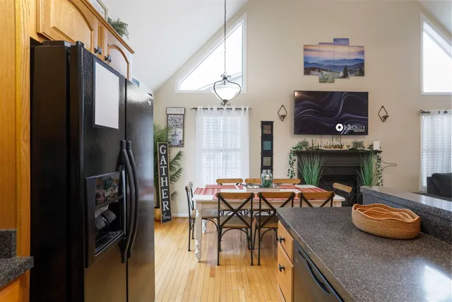 a view of a livingroom with furniture and a fireplace