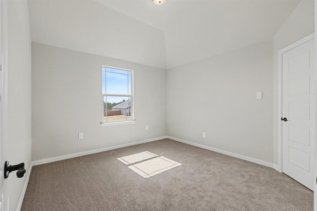 7041 Champion Road Midlothian, TX 76065 - Photo 24 of 30 an empty room with a window