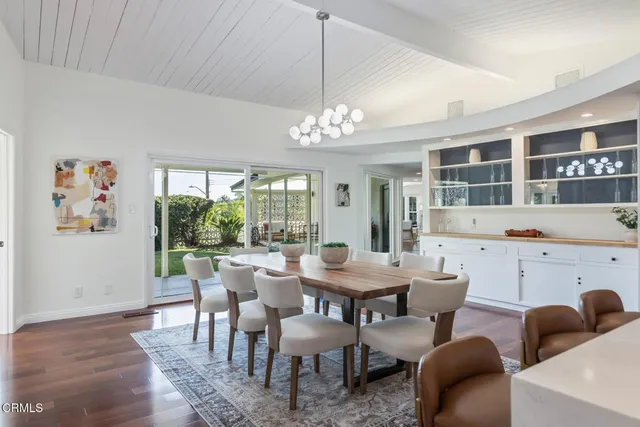 a kitchen with stainless steel appliances a sink stove and refrigerator