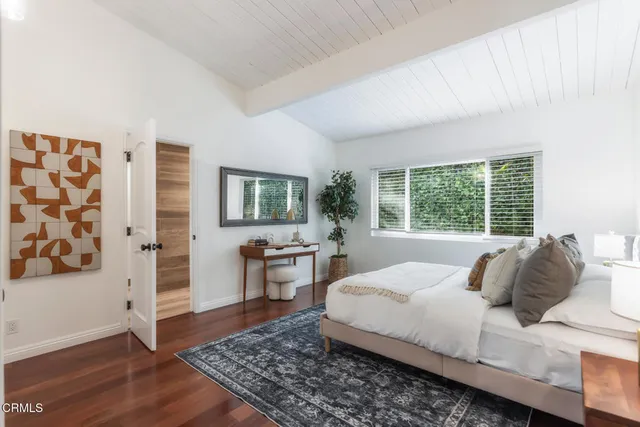 a bathroom with a shower and a sink