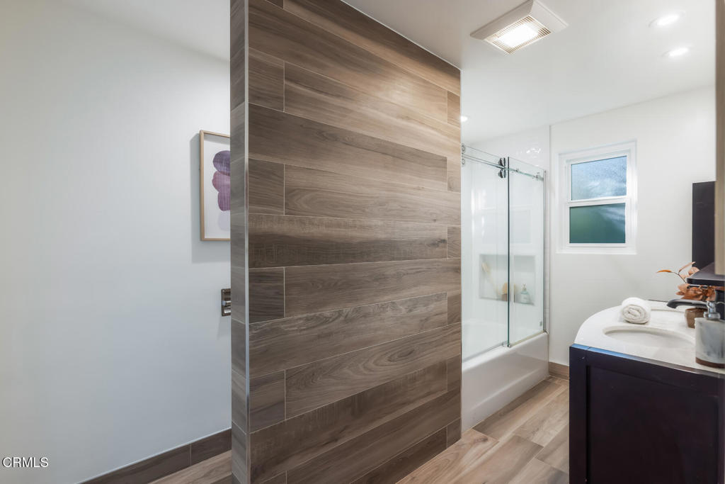1823 Risa Place Glendale, CA 91208 - Photo 25 of 36 a bathroom with a shower and a sink