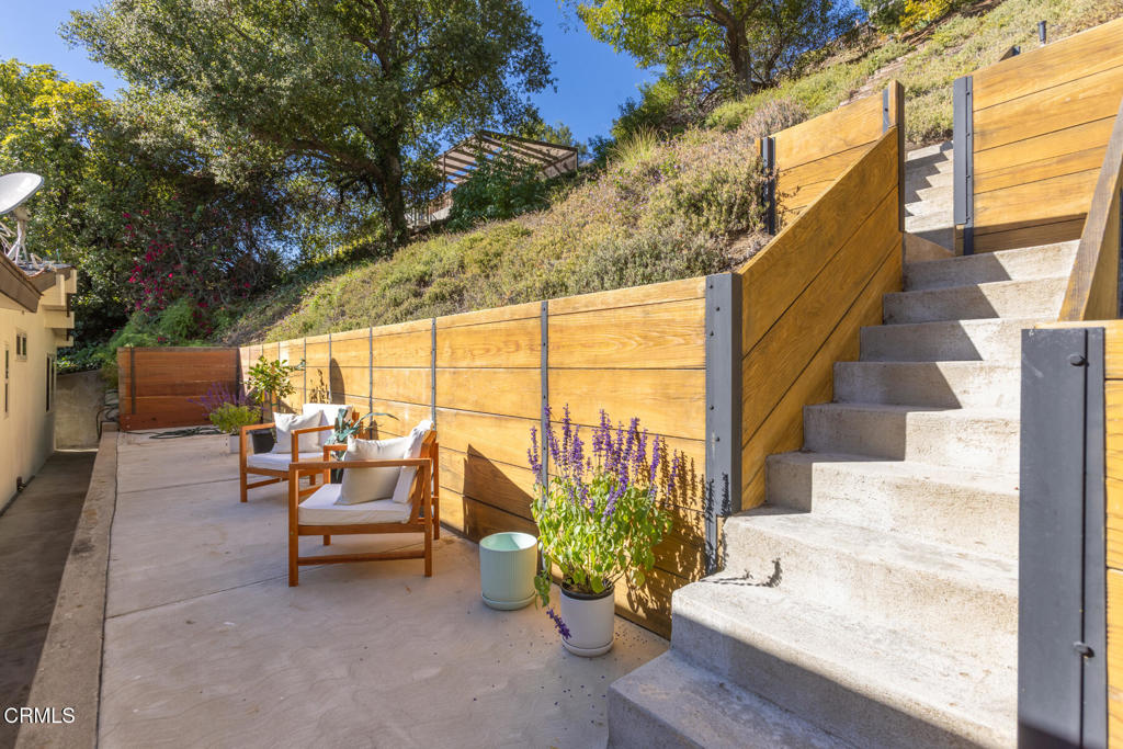 1823 Risa Place Glendale, CA 91208 - Photo 28 of 36 a building outdoor space with patio furniture and potted plants