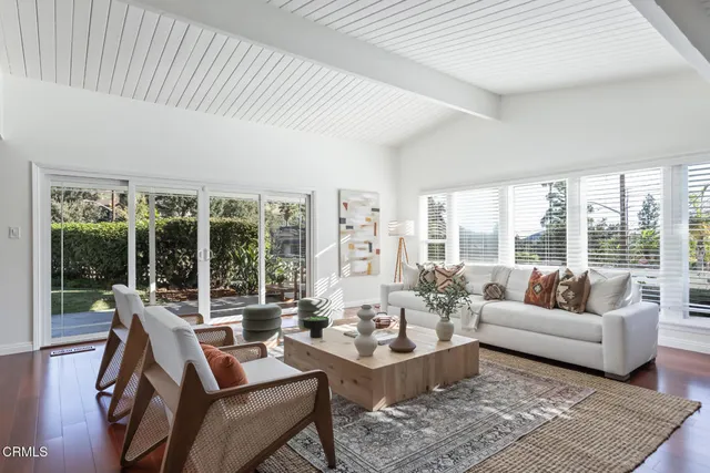 a bathroom with a shower and a sink