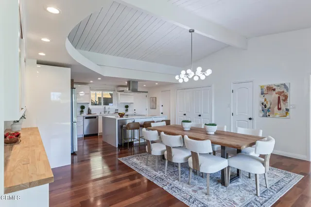 a view of a dining room with furniture