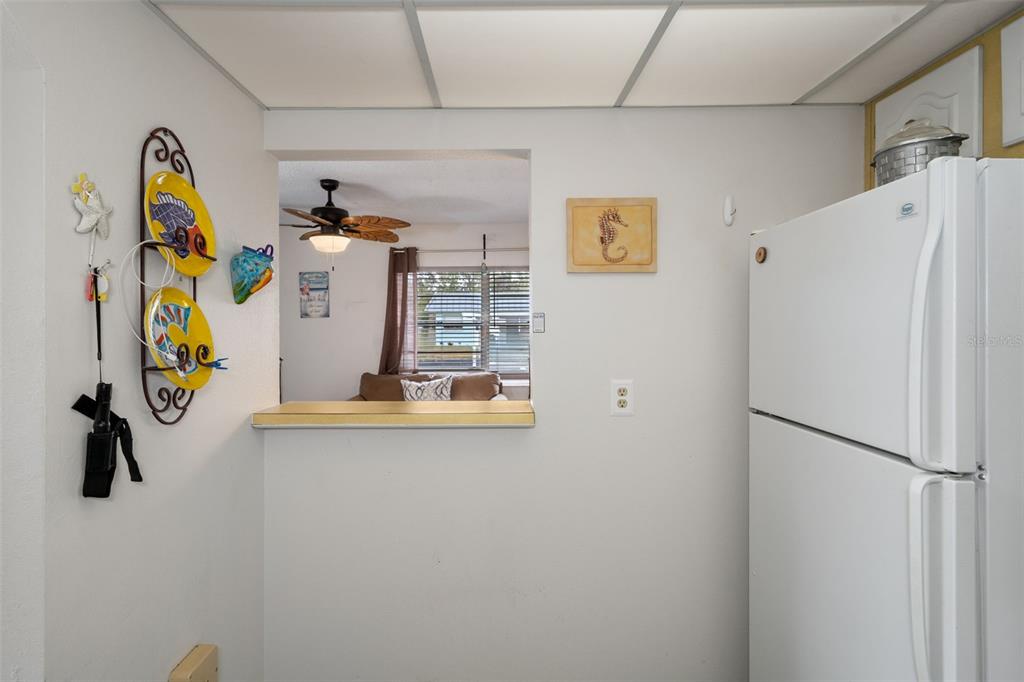 11630 Bayonet Lane New Port Richey, FL 34654 - Photo 12 of 58 a view of a storage & utility room with washer and dryer