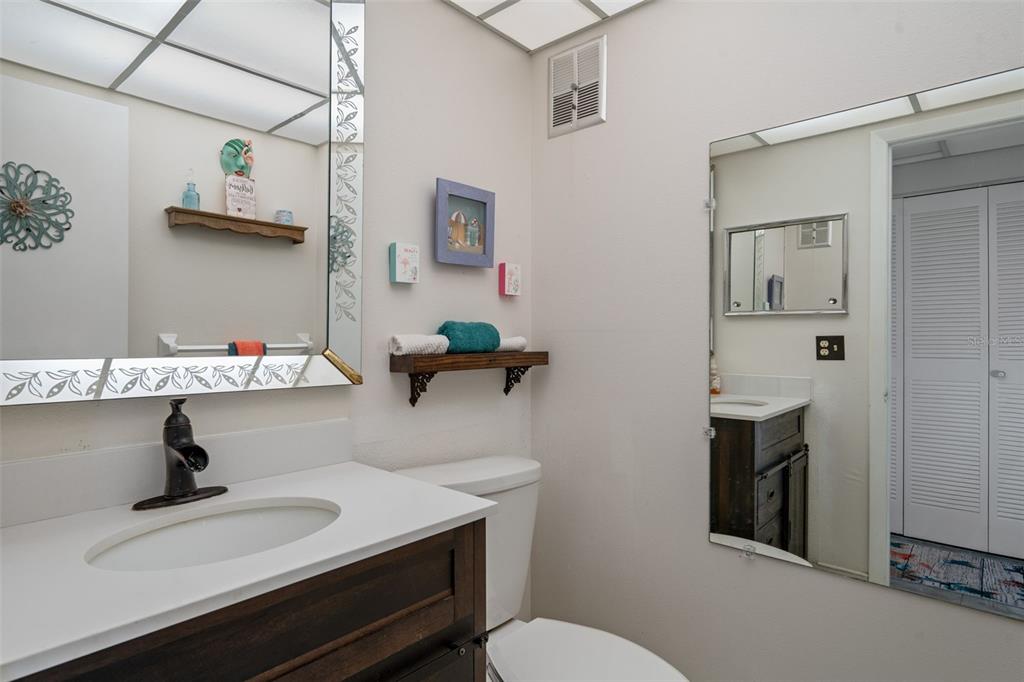 11630 Bayonet Lane New Port Richey, FL 34654 - Photo 15 of 58 a bathroom with a sink toilet and shower