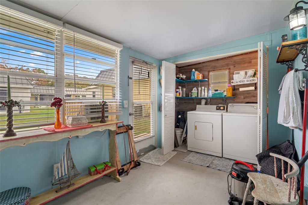 11630 Bayonet Lane New Port Richey, FL 34654 - Photo 23 of 58 a room with storage and utility