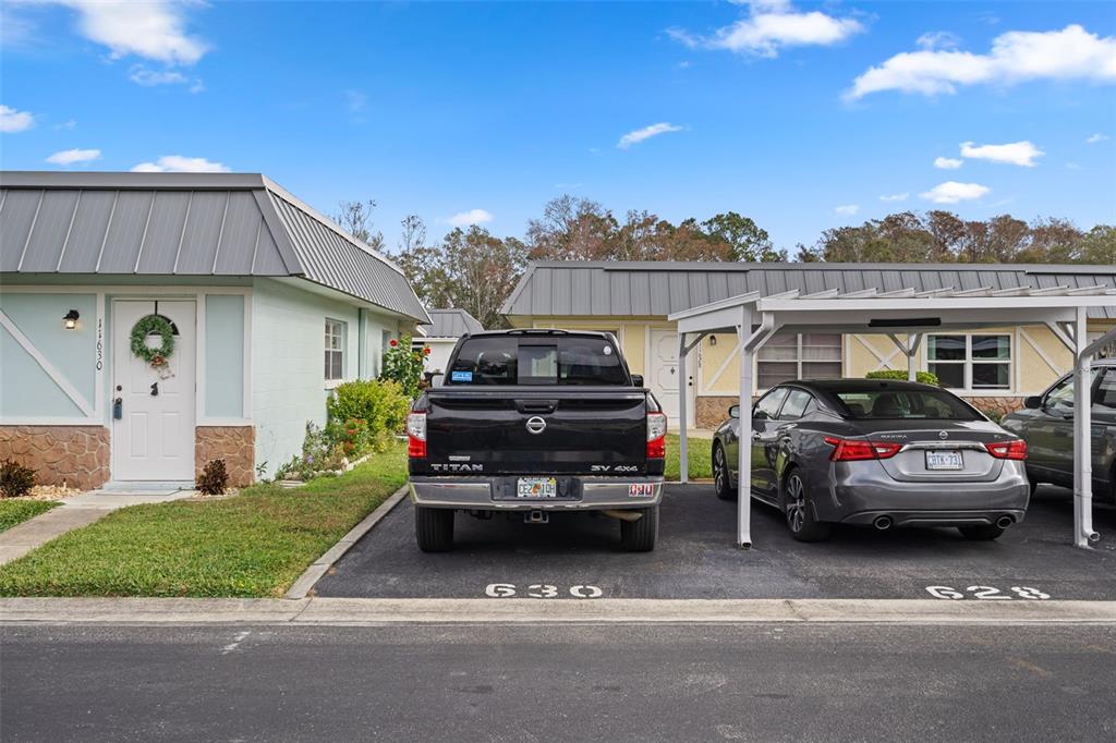 11630 Bayonet Lane New Port Richey, FL 34654 - Photo 28 of 58 a view of a car parked in front of a house