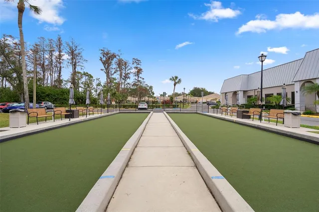 a view of a dining area with furniture and a chandelier