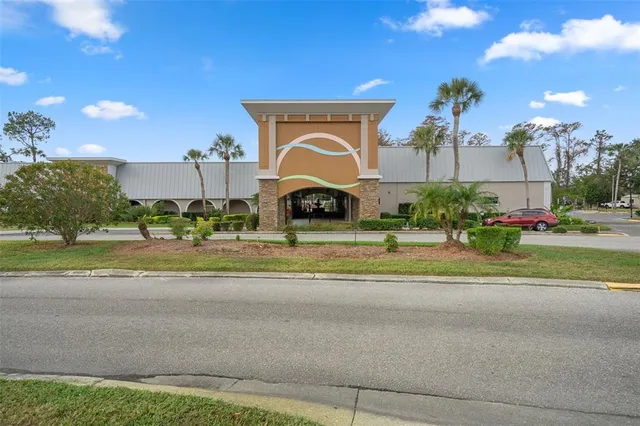 a view of swimming pool with outdoor seating