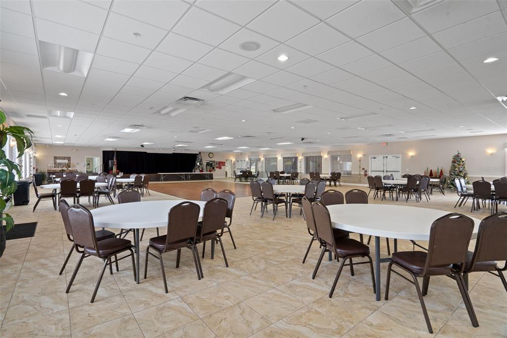 11630 Bayonet Lane New Port Richey, FL 34654 - Photo 41 of 58 a view of a dining area with furniture and a chandelier