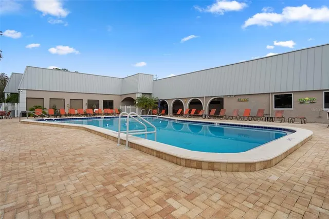 a view of a a dining room with lots of chairs
