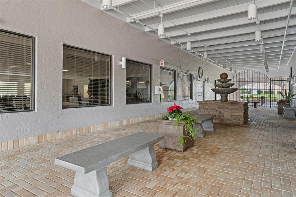 11630 Bayonet Lane New Port Richey, FL 34654 - Photo 56 of 58 a lobby with furniture and flowers