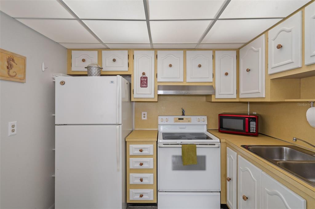 11630 Bayonet Lane New Port Richey, FL 34654 - Photo 10 of 58 a utility room with dryer and washer