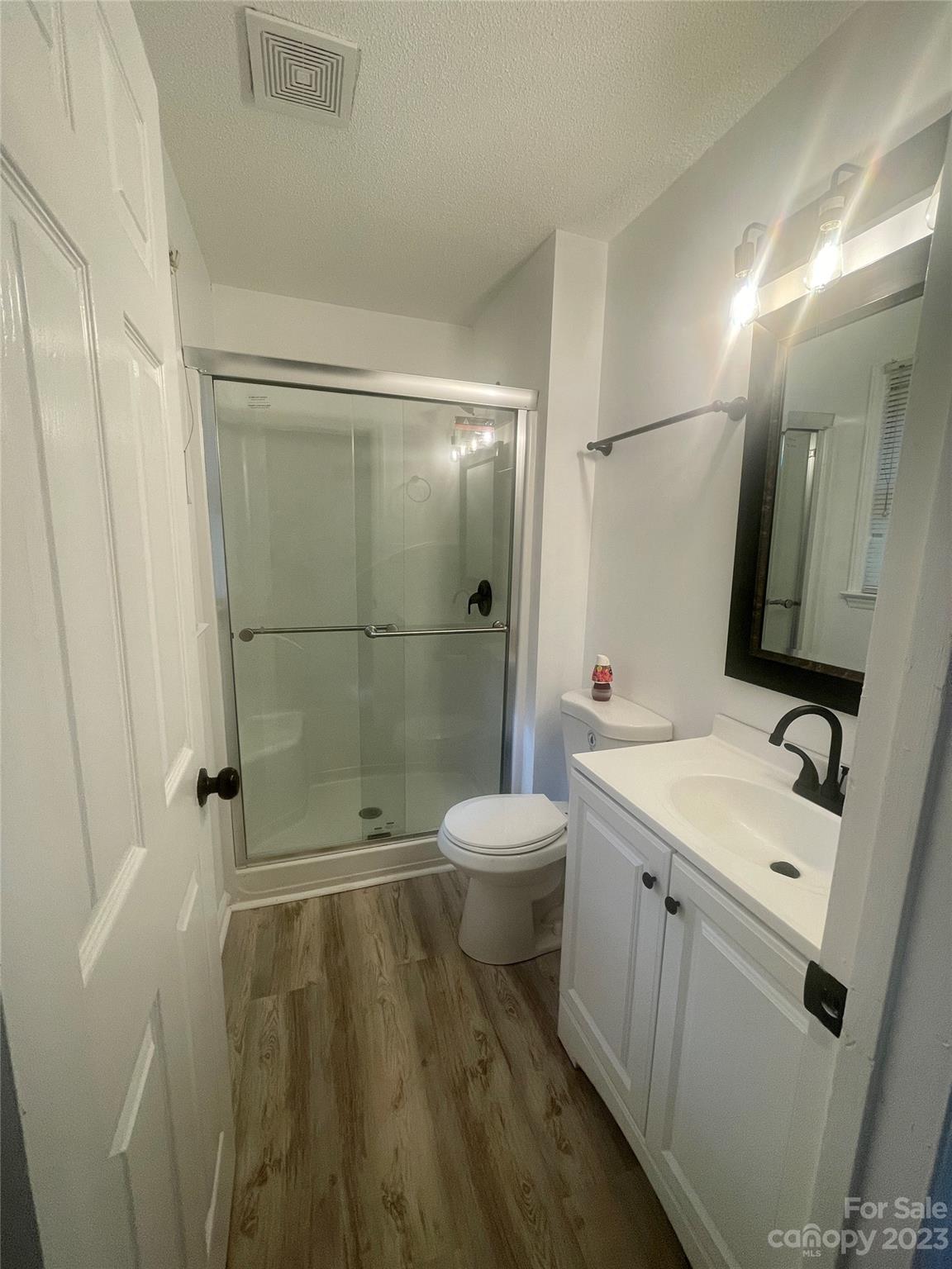 326 Finley Square Rock Hill, SC 29730 - Photo 14 of 15 a bathroom with a sink a toilet and shower