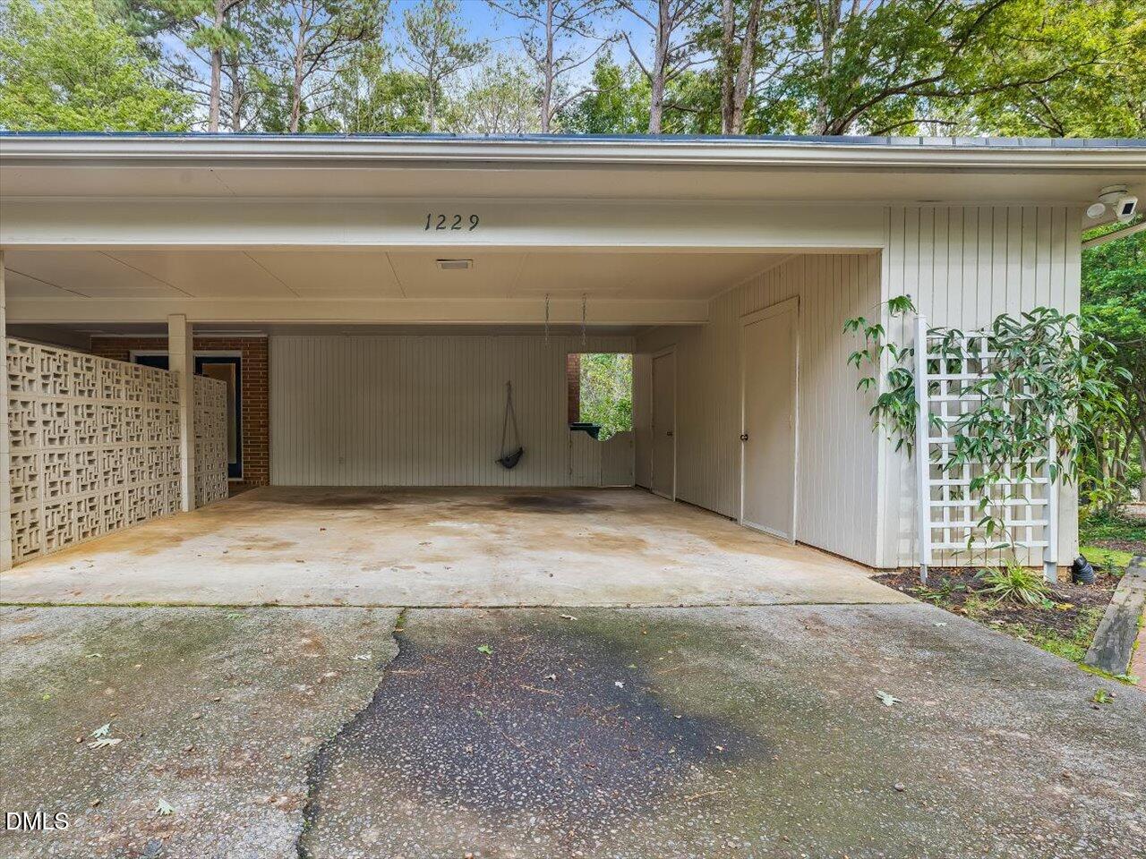 1229 Fairlane Road Cary, NC 27511 - Photo 49 of 60 56-Carport with Storage