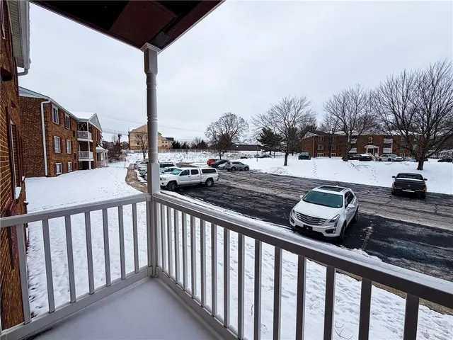 a view of a balcony with city view