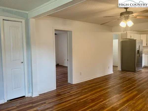 a view of a livingroom with wooden floor