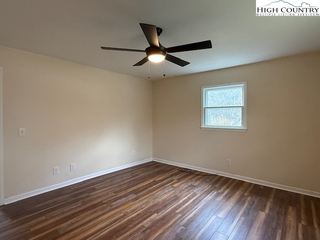 304 Elk River Road Elk Park, NC 28622 - Photo 24 of 36 a view of empty room with wooden floor