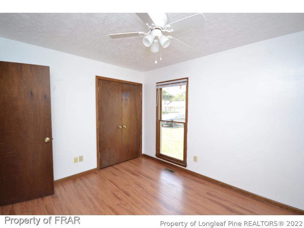 612 Jennings Farm Road Fayetteville, NC 28314 - Photo 13 of 27 a view of an empty room with a window
