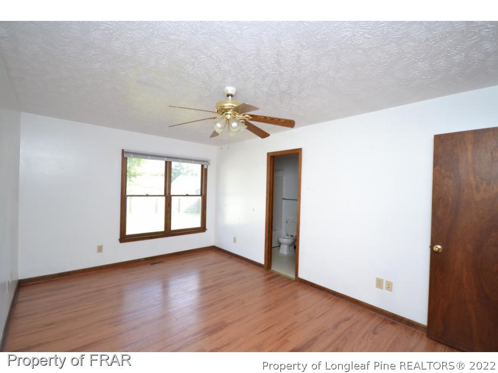612 Jennings Farm Road Fayetteville, NC 28314 - Photo 17 of 27 a view of an empty room with a window