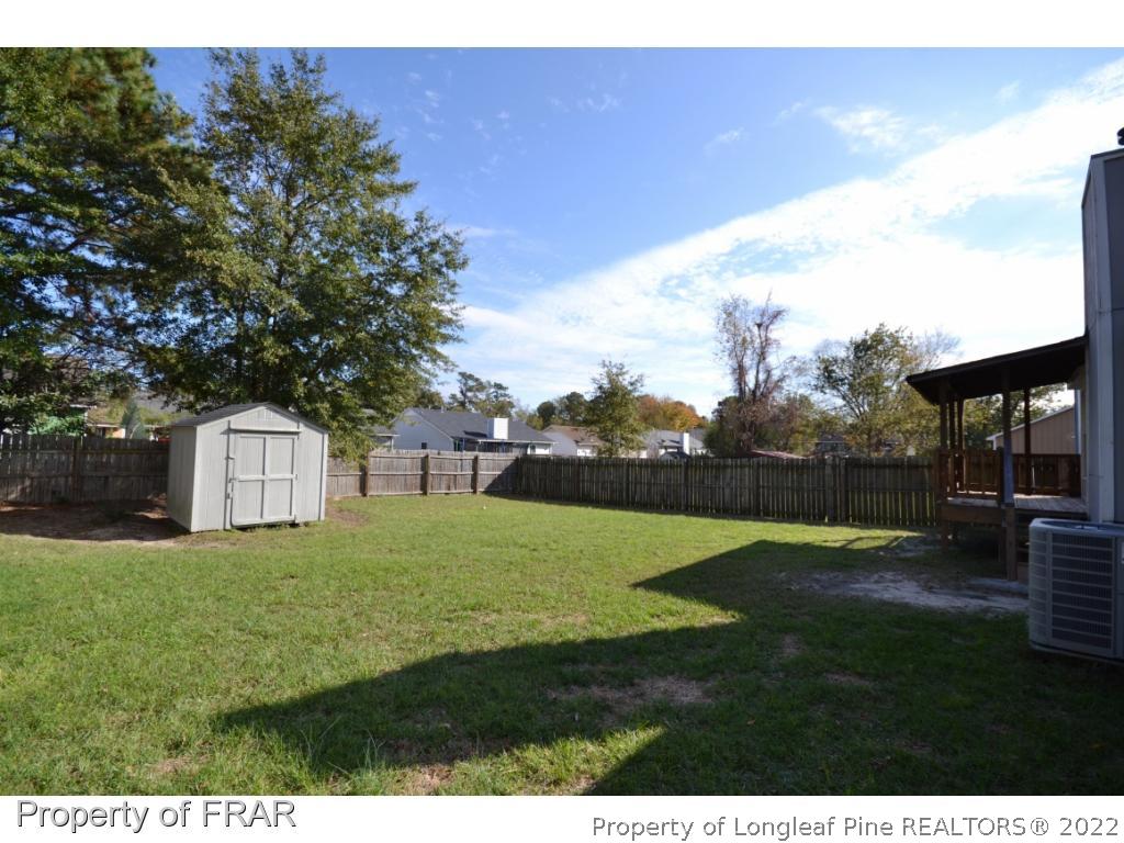 612 Jennings Farm Road Fayetteville, NC 28314 - Photo 23 of 27 a view of big yard with a house