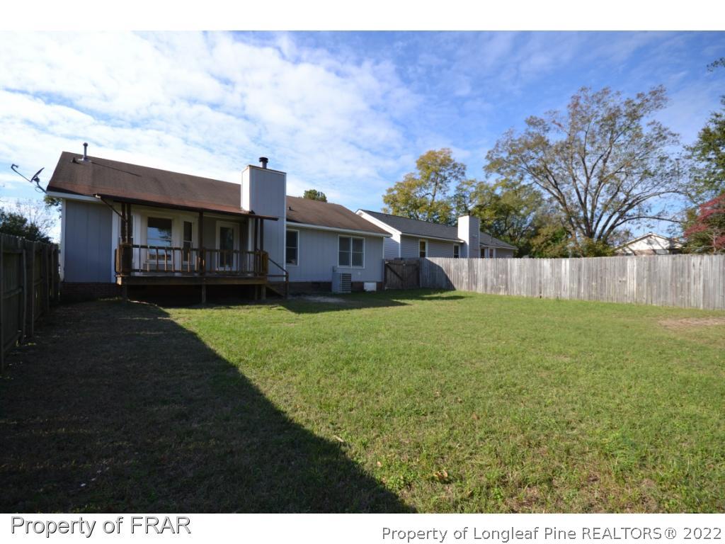 612 Jennings Farm Road Fayetteville, NC 28314 - Photo 27 of 27 a view of outdoor space yard and front view of a house