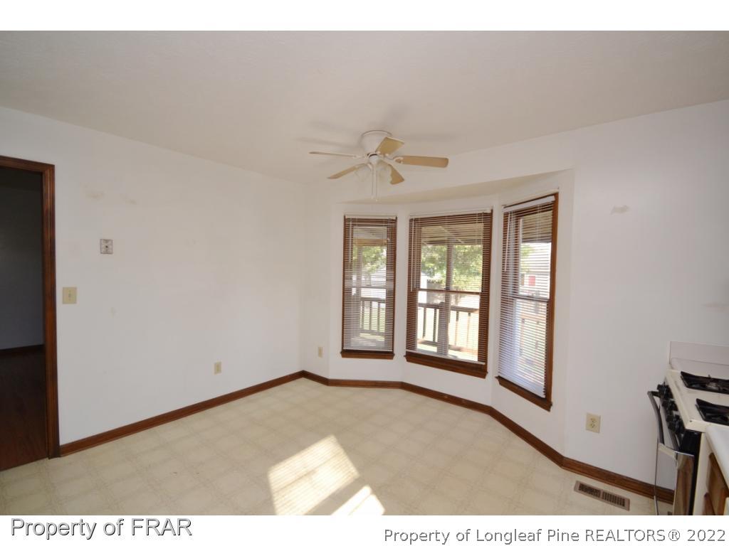 612 Jennings Farm Road Fayetteville, NC 28314 - Photo 10 of 27 a view of an empty room with a window