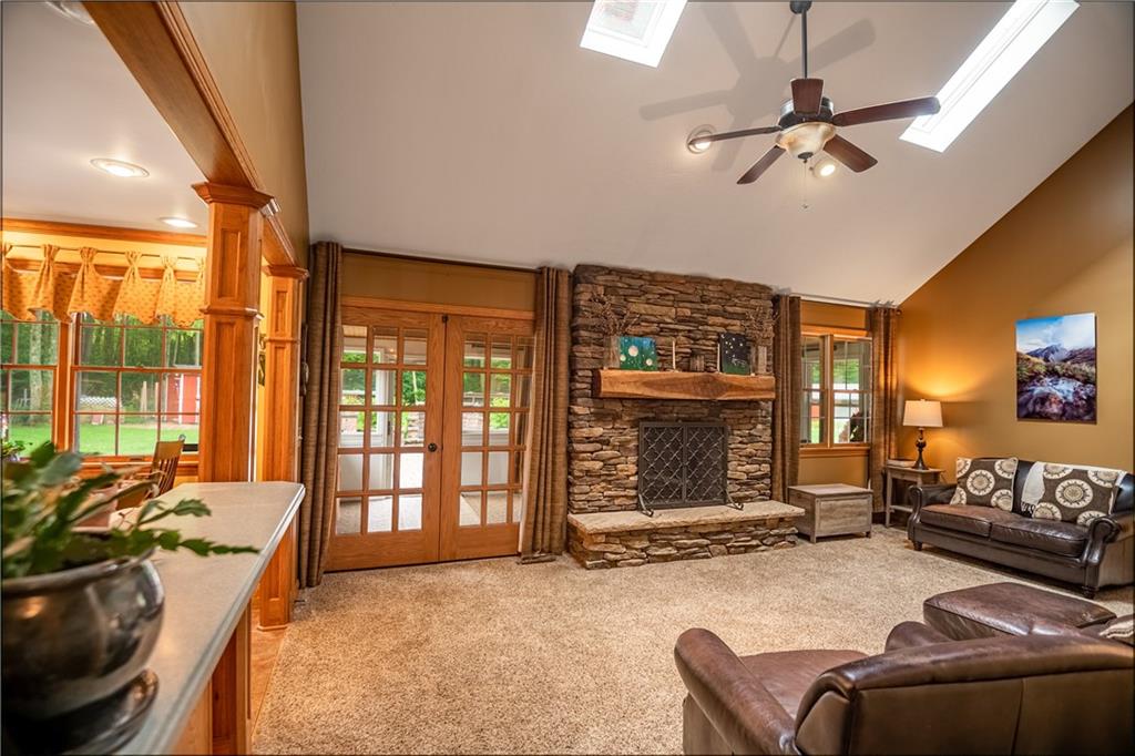 289 Nutt Road Grove City, PA 16127 - Photo 9 of 25 a living room with furniture and a floor to ceiling window