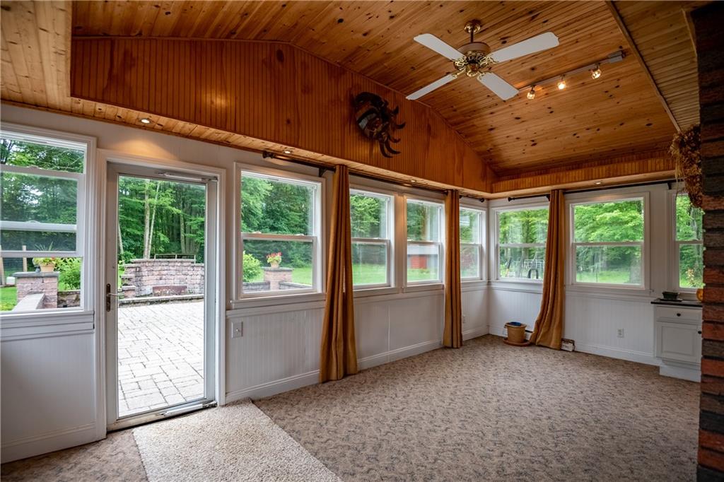 289 Nutt Road Grove City, PA 16127 - Photo 10 of 25 a big room with wooden floor and windows