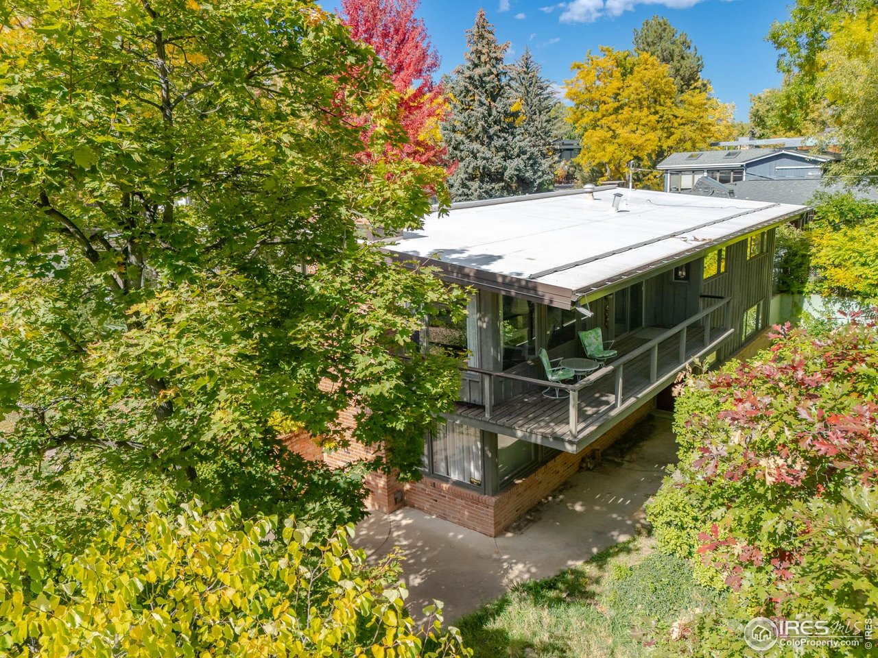 2207 Bluebell Avenue Boulder, CO 80302 - Photo 14 of 47 a view of a house with a yard