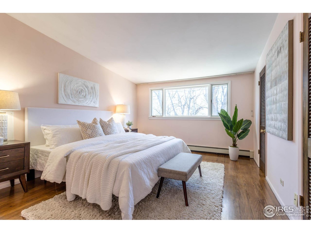 2207 Bluebell Avenue Boulder, CO 80302 - Photo 19 of 47 a bed room with a bed and a chair