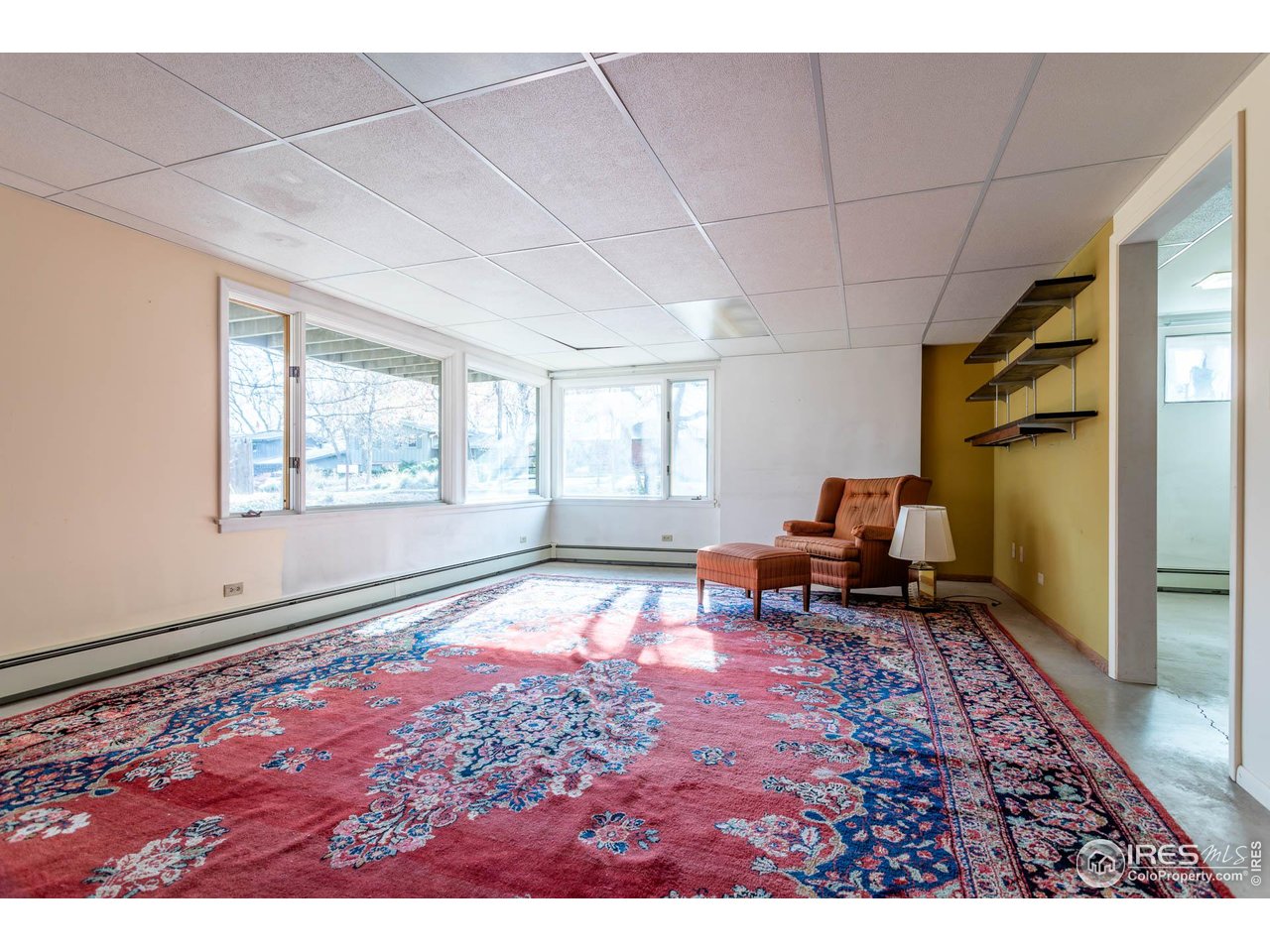 2207 Bluebell Avenue Boulder, CO 80302 - Photo 29 of 47 a living room with furniture and a rug