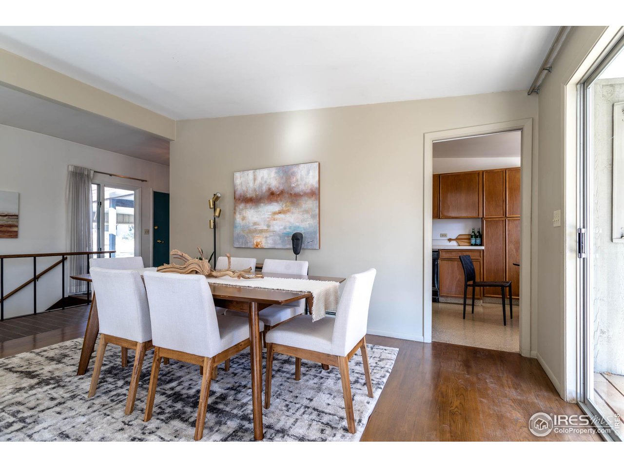 2207 Bluebell Avenue Boulder, CO 80302 - Photo 6 of 47 a view of a dining room with furniture and wooden floor