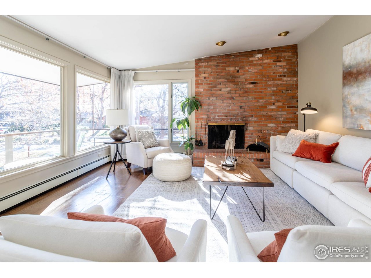 2207 Bluebell Avenue Boulder, CO 80302 - Photo 9 of 47 a living room with furniture and a fireplace