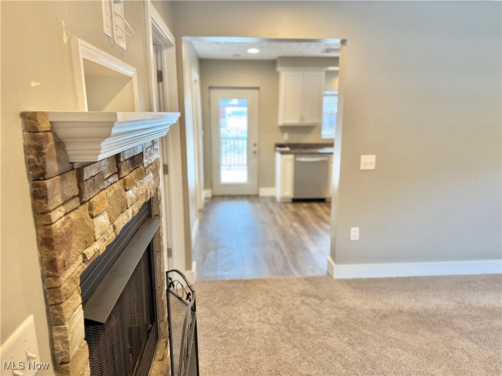 3024 Dutt Road Barberton, OH 44203 - Photo 14 of 33 VIEW OF THE FIREPLACE, FACING THE KITCHEN. ENTIRE HOME HAS BEEN REMODELED IN 2019!